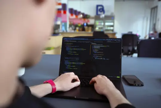 man working on computer 