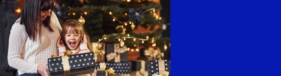 kid opening christmas' presents