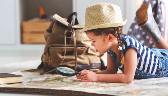 The girl is watching a map